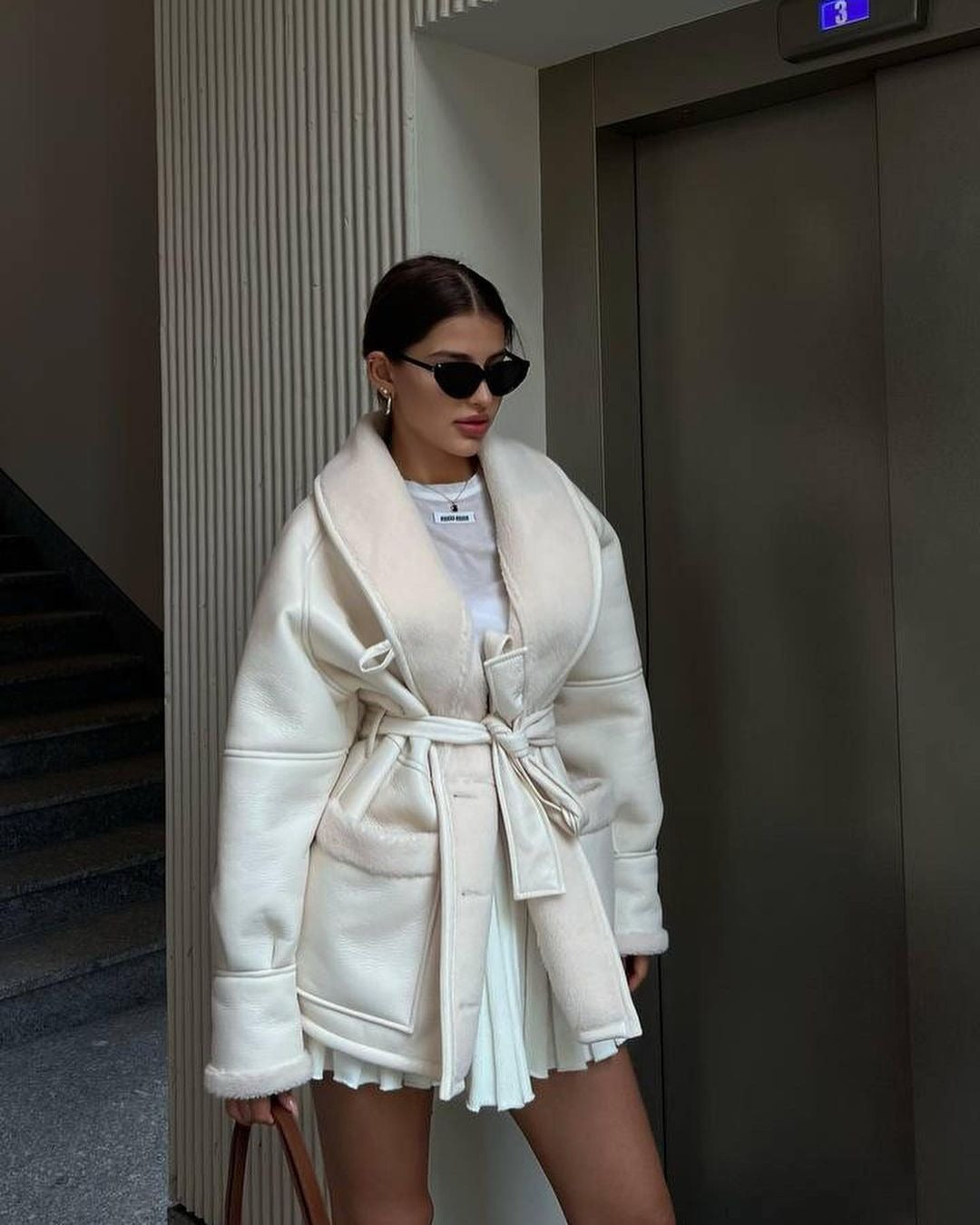 Eleganter langer Mantel